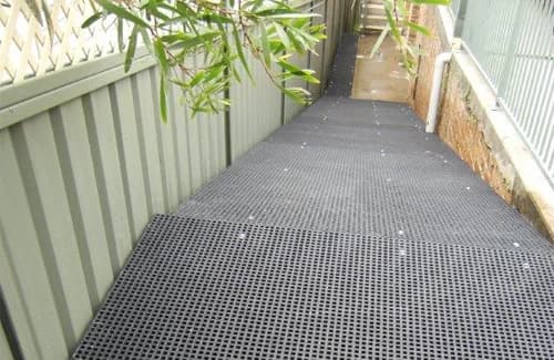 Open mesh fiberglass walkway shown in Strongrate factory materials